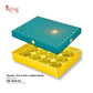 A teal and gold laddoo box shown open with its lid propped above, revealing a yellow tray with multiple laddoos inside. The Royal Shop logo appears in the top left, and product text at the bottom reads 'Sweets, Dry Fruits, Laddoo Boxes' with item code RBF 2608 D6.
