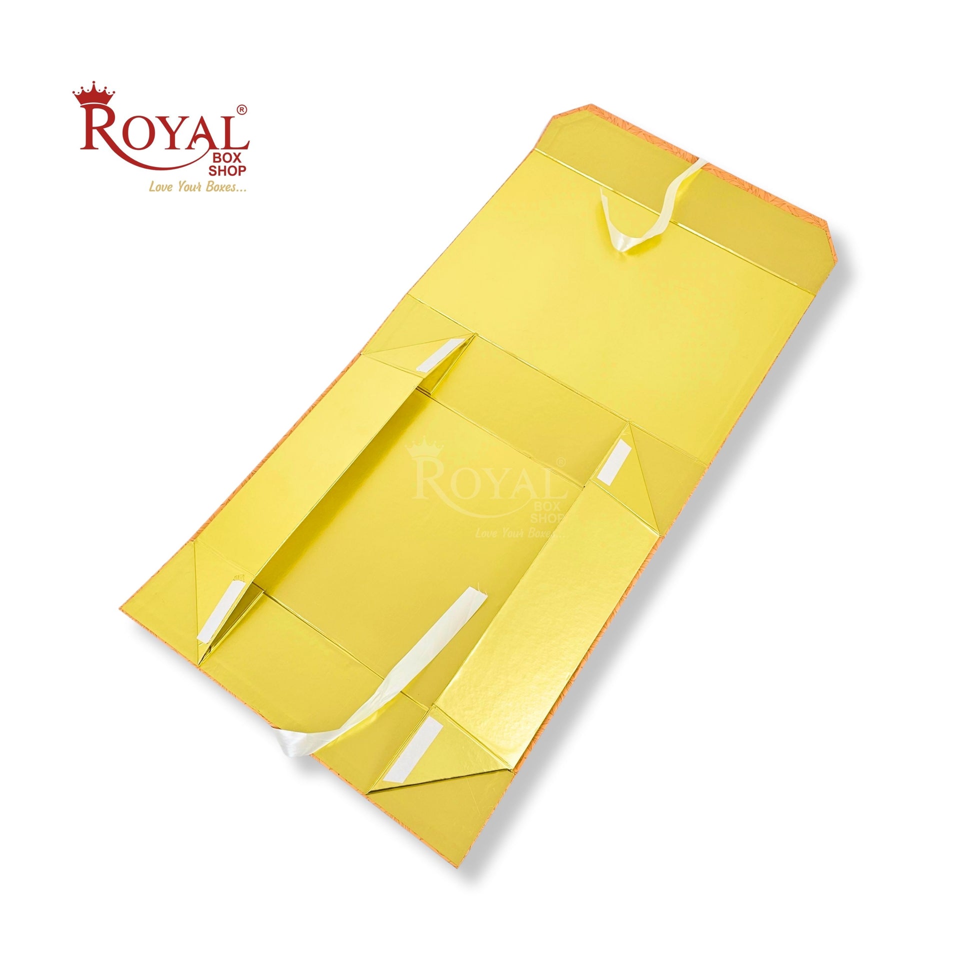 A gold metallic gift box with white handle loops, shown open on a white background with a Royal Box Shop logo in the top left.