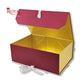An open royal presentation gift box with a deep gold interior and burgundy patterned exterior, shown with dimension lines indicating its measurements on a white background.